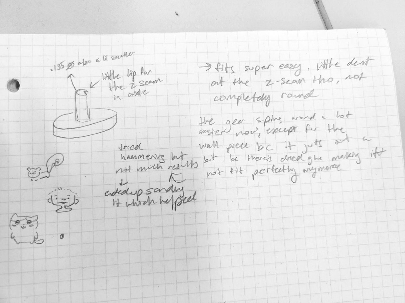 Handwritten notes on the second print: smaller axle with a lip for the z-seam, gear spins easier, glue at the wall piece, sanding helped