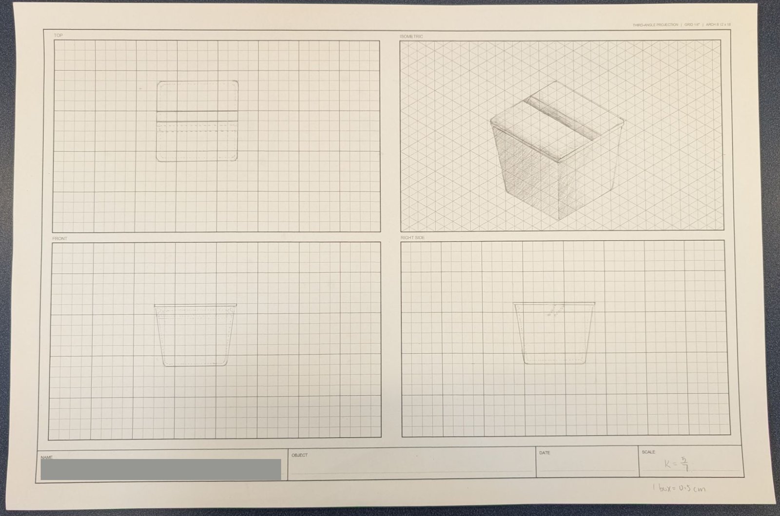 Student drawing of a tapered, round-cornered box with a slot across the top, in top, front, right side, and shaded isometric views