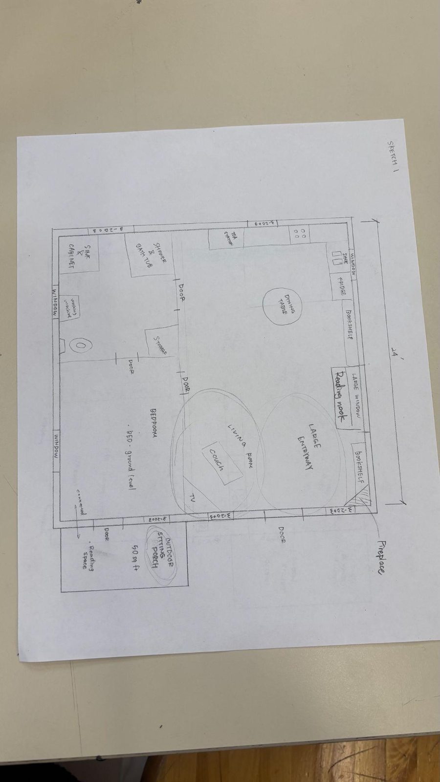 A pencil floor plan sketch with rooms, windows, doors and furniture labeled, and bubbles drawn over the living room and entryway